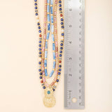 Layered Semi Precious Bead Sunburst Medallion Necklace