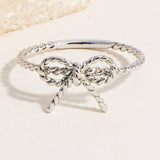 Twisted Metallic Ribbon Bow Band Ring