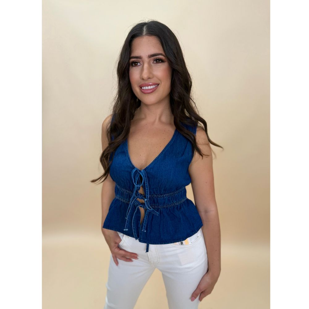 blue sleeveless top with front tie